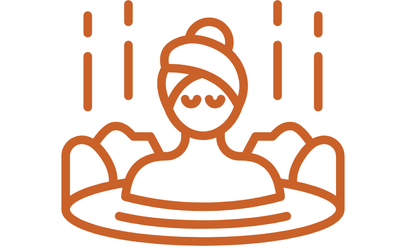 A person relaxing in a hot spring.